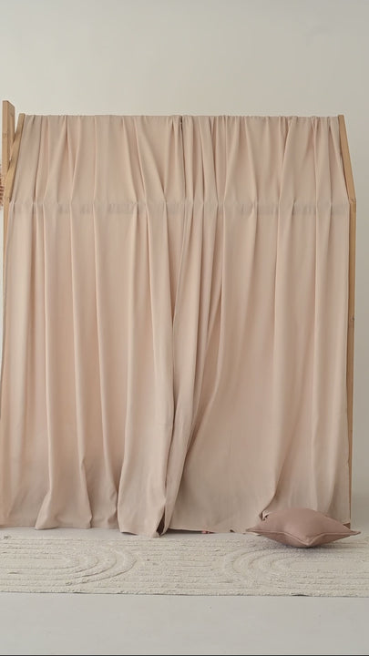 Toddler bed with soft pink linen canopy curtains