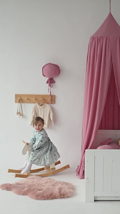 Hanging nursery canopy in pale pink