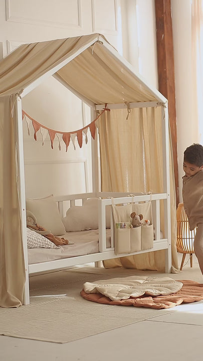 Close up of soft beige linen fabric of Baby Canopy Curtain for a serene nursery setup
