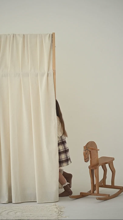 Minimalist canopy bed curtains in soft neutral tone